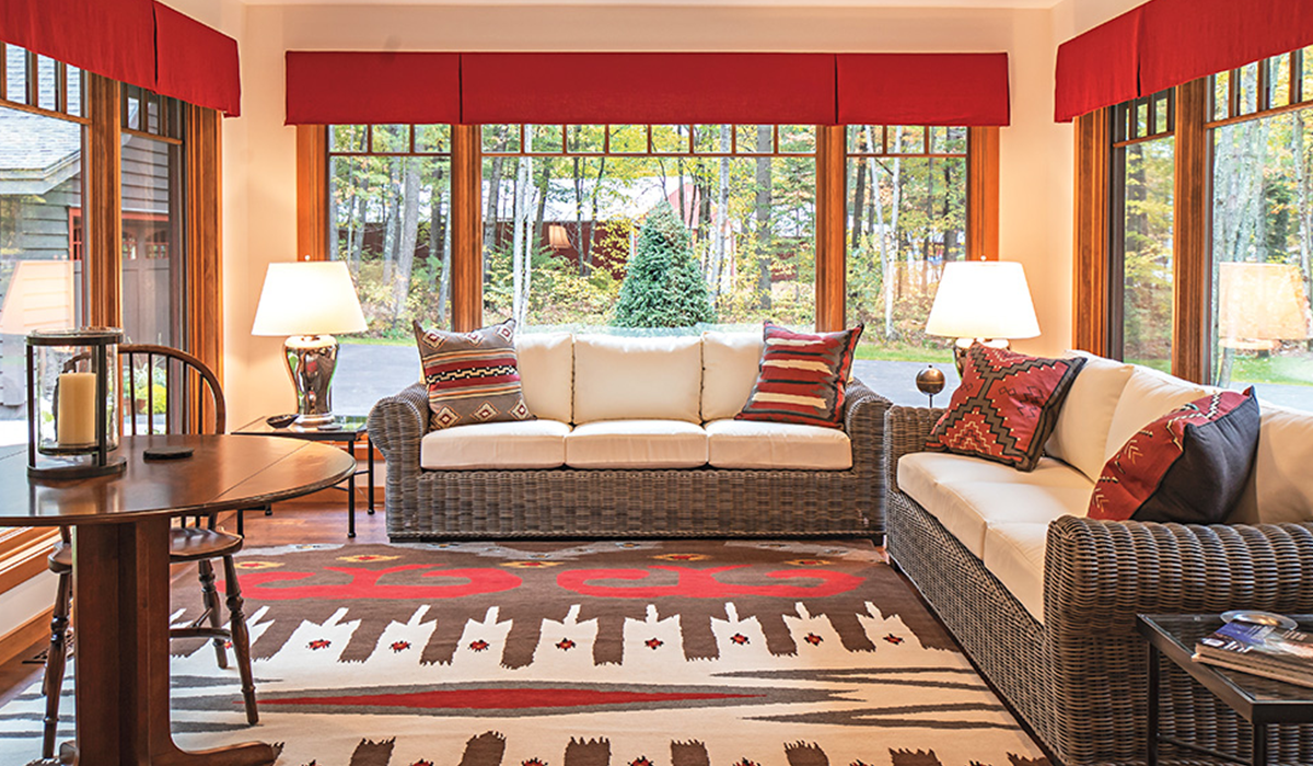 Enjoy the sunshine, snowflakes or fall colors in the cozy sunroom.