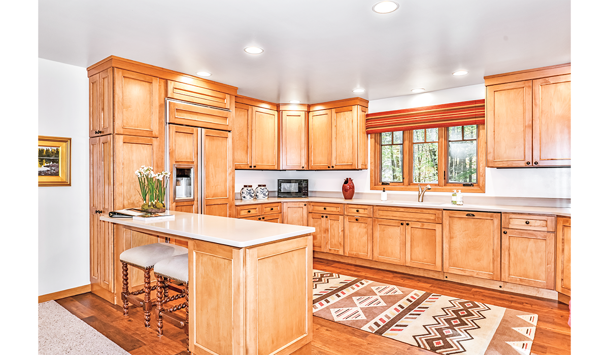 Spacious full-size kitchen with convenient breakfast bar.
