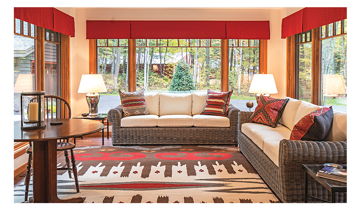 Enjoy the sunshine, snowflakes or fall colors in the cozy sunroom.