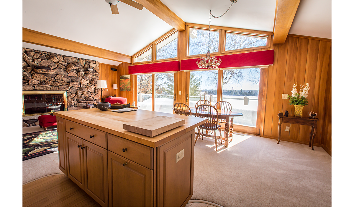 Enjoy year-round lake views from inside or on the deck.