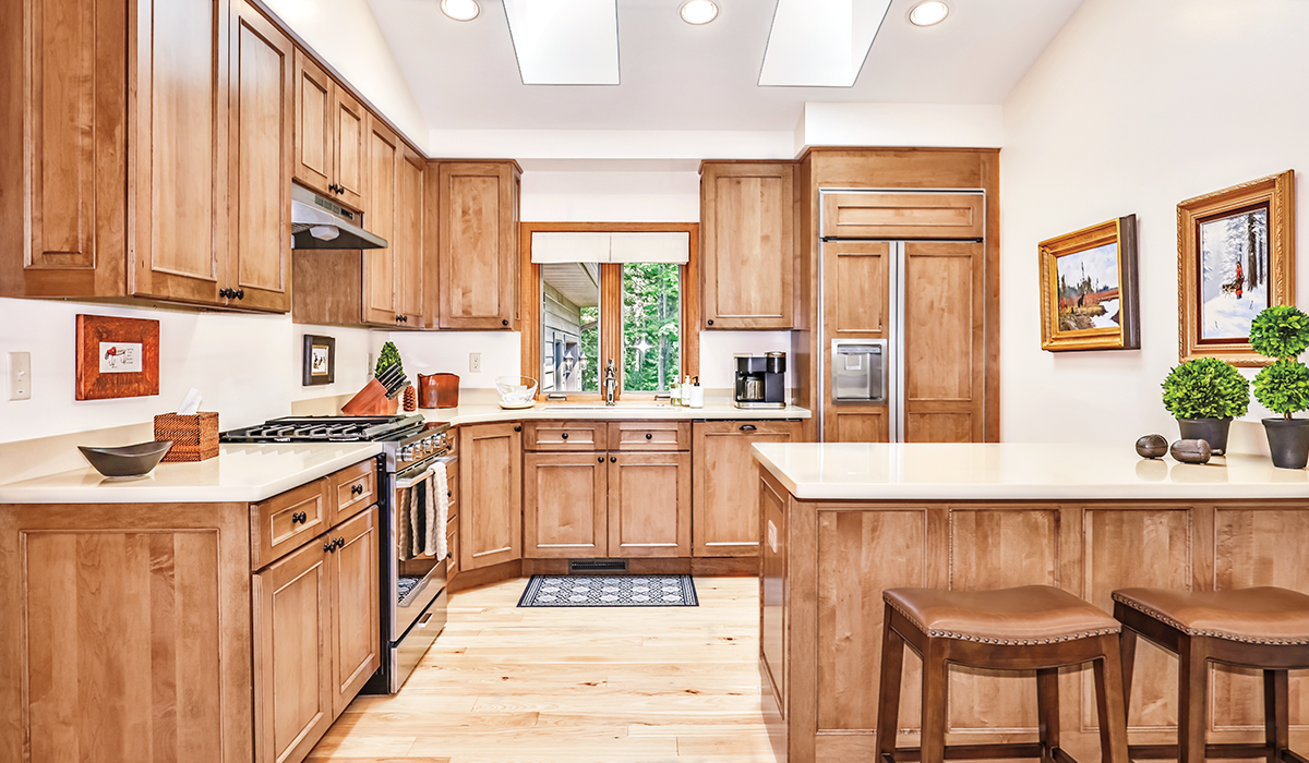 Bright, fully equipped kitchen with breakfast bar.