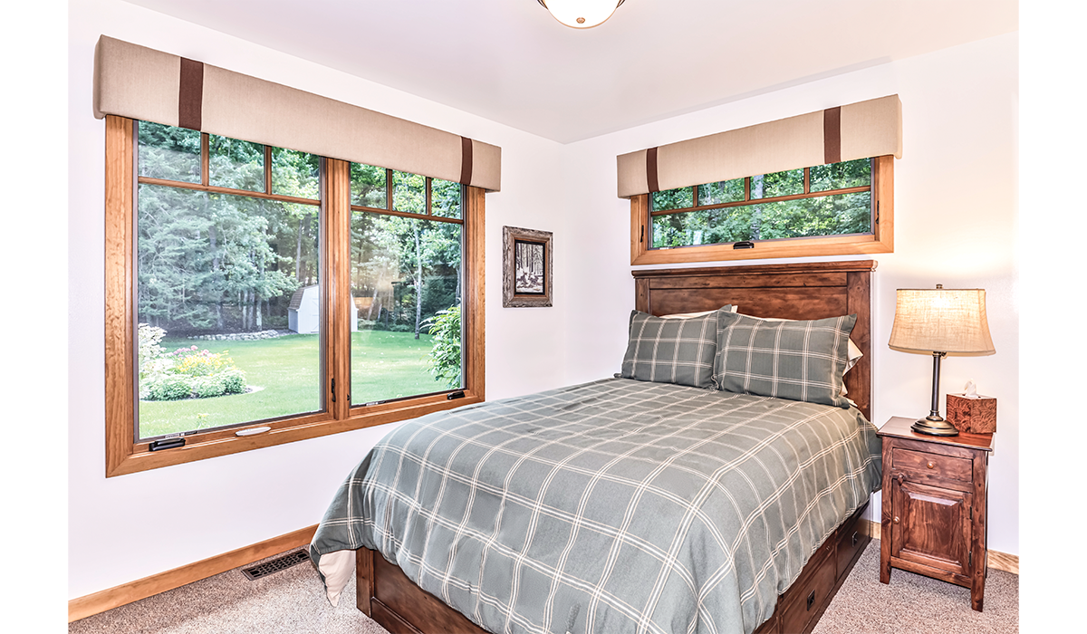 Bedrooms with large windows immerse you in the scenery.