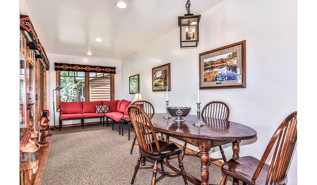 Dining and lounge area with uninterrupted lake views!