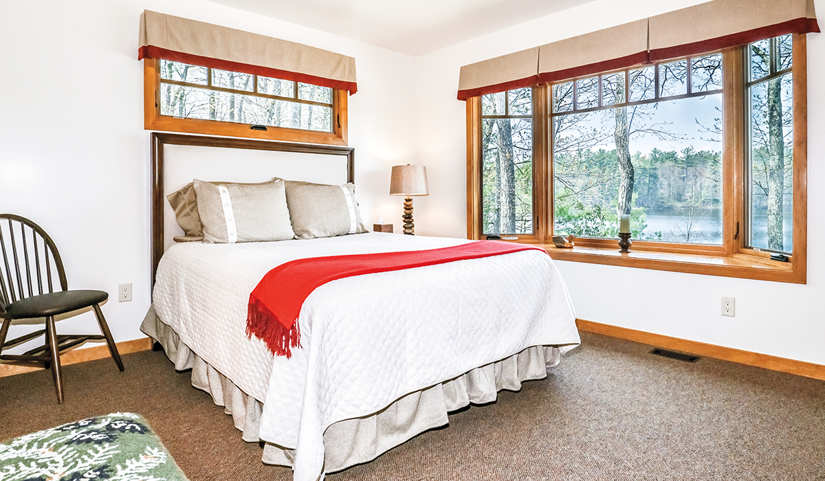 Look at that view! A wall of windows overlook Vance Lake.